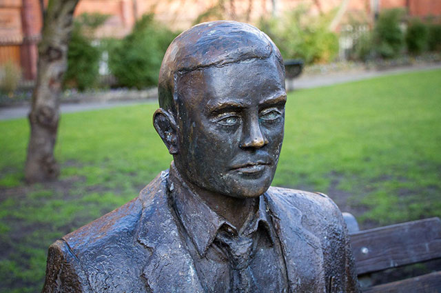 a statue of a man in a park