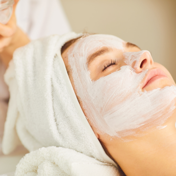 female client at the midland rena spa receiving a facial relaxin