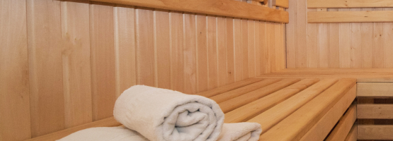 wooden sauna with a towel placed inside at the rena spa at the m