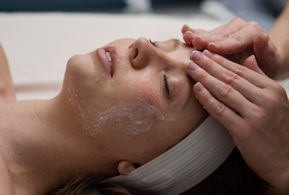 female client at the midland rena spa with body scrub on her bac