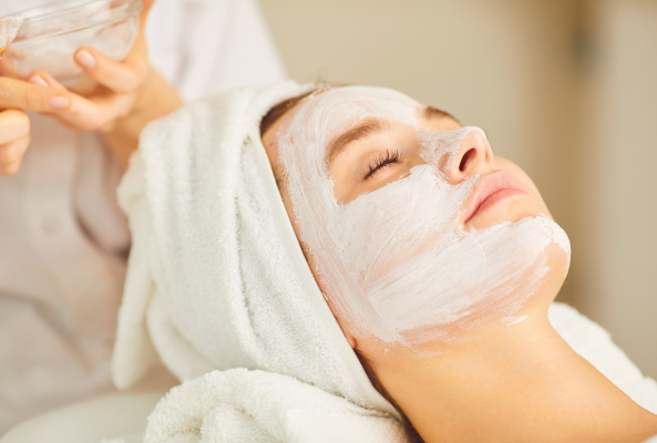 female client at The Midland Rena Spa receiving a facial
