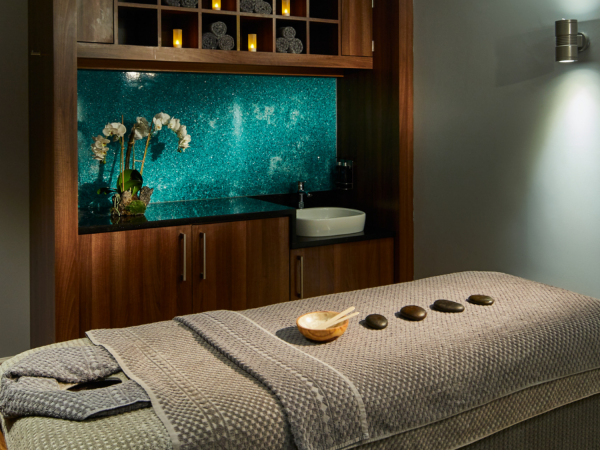 the midland treatment room with stone treatment on the bed with