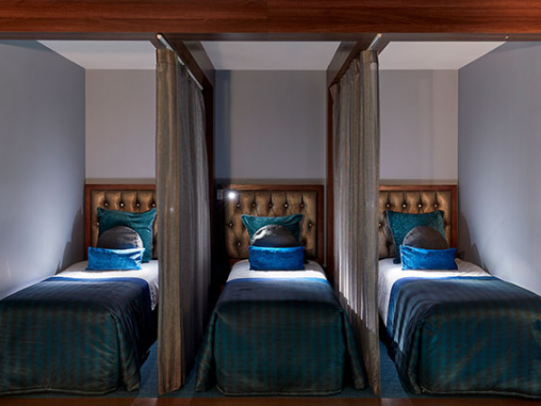the midland rena spa treatment beds with wall dividers between t