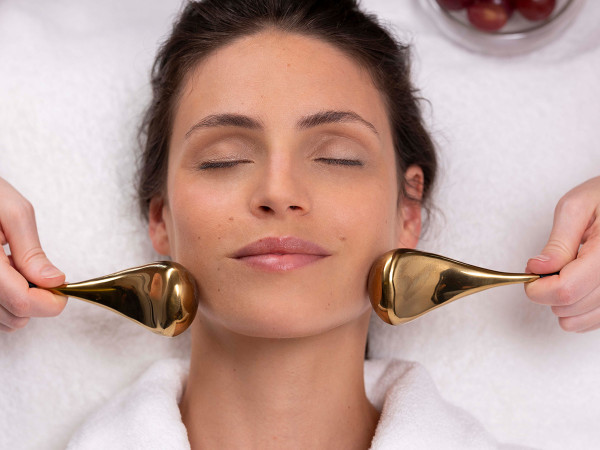 female client at the midland rena spa receiving a facial treatme